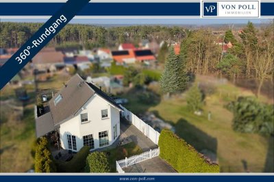 Freistehendes Einfamilienhaus mit liebevollem Garten