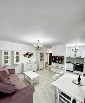 1,5-Zimmer-Wohnung mit möblierter Küche und sonnigem Balkon und herrlicher Aussicht!