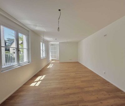 Besonderheit - Zentraler Wohntraum mit Balkon und Stellplatz