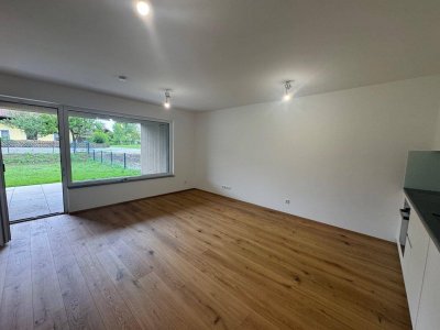 Einziehen und Wohlfühlen | Traumhafte 3,5 Zimmer Gartenwohnung in Koppl | Erstbezug mit Souterrain, Loggia, Terrasse und Stellplätzen