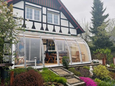 WOHNEN wie im Urlaub  - ca. 100 m² Erdgeschoss-Wohnung mit herrlichem Garten