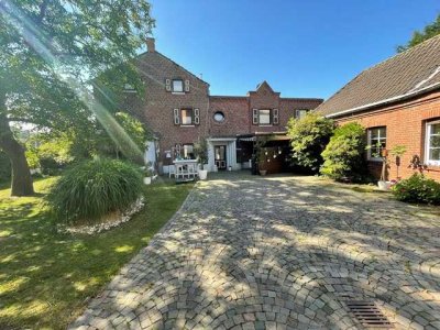 Wohnen und Arbeiten unter einem Dach – Charmantes Haus mit Gewerbefläche in MG-Windberg