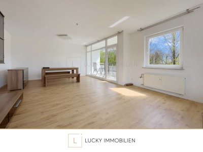 Saniert, Südbalkon, EBK - Großzügige 2,5-Zimmer-Wohnung in ruhiger Lage!