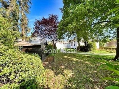 Winkelbungalow mit Garten, Terrasse und Garage in attraktiver Lage!