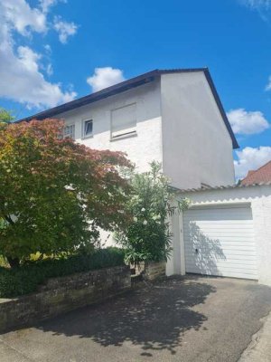 Doppelhaus mit tollem Garten und viel Nutzfläche im DG + UG