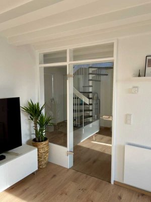 Stilvoll renovierte 3,5 Zimmer-Wohnung mit EBK in Ilvesheim mit Gemeinschaftsgarten und Parkplatz