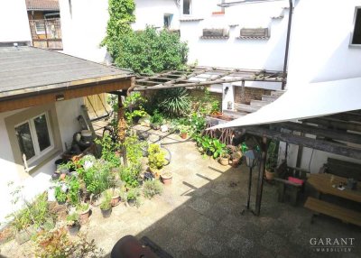 Stadtoase - Mediterranes Einfamilienhaus mit separatem Appartement