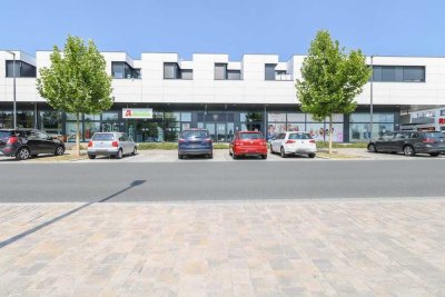 Stilvolle 2-Zimmer-Wohnung mit offener Markenküche, Duschbad und Tiefgaragenstellplatz