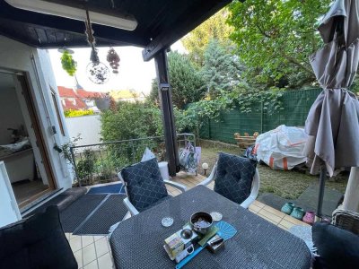 Wunderschöne Terassenwohnung mit Gartenanteil