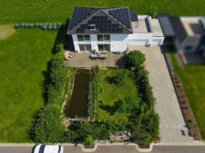 Elegante Stadthausvilla mit modernster Energietechnik und Gartenparadies in Kalbach