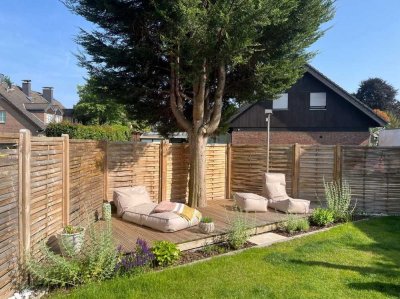 Neuwertige 4-Zimmer-Wohnung mit Garten und Einbauküche in Meerbusch
