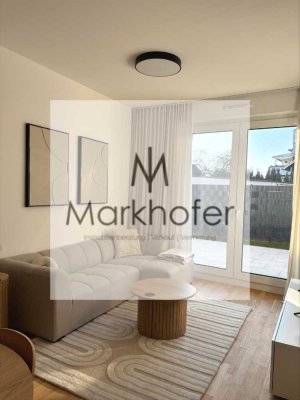 Teilmöbilierte Neubau - Erdgeschoss- Wohnung mit 2 Zimmern und Terrasse zu vermieten !