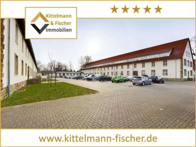 Exklusiv Wohnen im Grünen – 3-Zimmer-Erdgeschosswohnung mit Flair eines eigenen Hauses