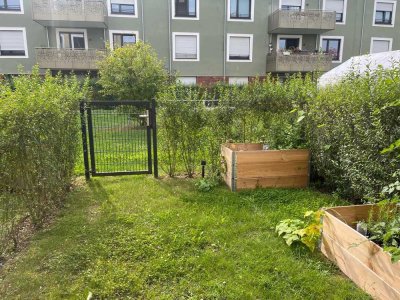 Lichtdurchflutete 2-Zimmer-EG-Wohnung mit Terrasse und kleinem Garten