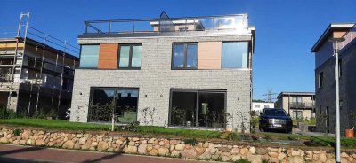 Top Lage DHH 128 m²  mit Dachterrasse und Schleiblick