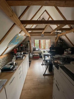 Charmantes Einfamilienhaus mit separatem Hinterhaus in zentraler Lage.