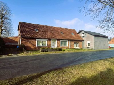 Mehrfamilienhaus mit großer gut laufender Autowerkstatt-/ Halle zu verkaufen