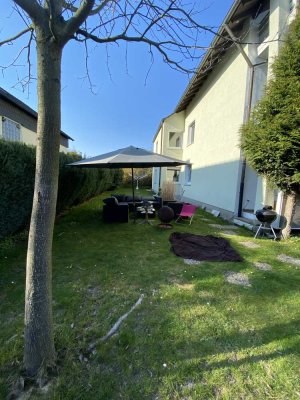 Familienfreundliche Erdgeschosswohnung mit Garten und Garage in bester Wohnlage!