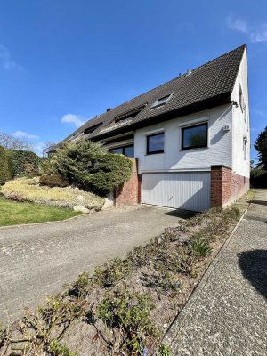 Helle und modernisierte 3-Zimmer-Wohnung mit Terrasse und Garten