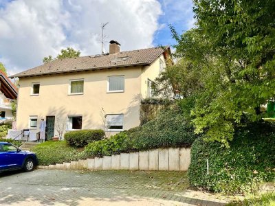 Schönes, großzügiges Einfamilienhaus mit attraktiver Einliegerwohnung in ruhiger Feldrandlage