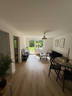 Möblierte Souterrain-2-Zimmer-Wohnung mit Terrasse und Einbauküche