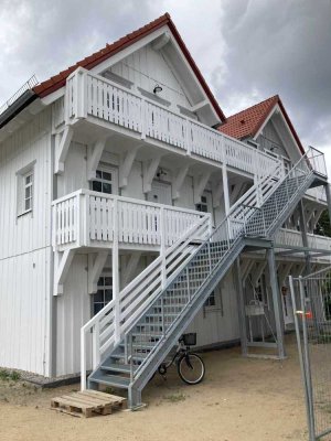 wunderschöne Dachgeschosswohnung mit zwei Balkonen im Holzneubau