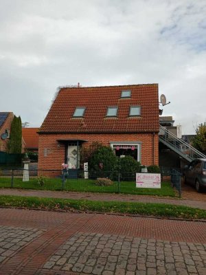 Greetsiel: Zwei Ferienwohnungen unter einem Dach in Hafen- & Mühlennähe.