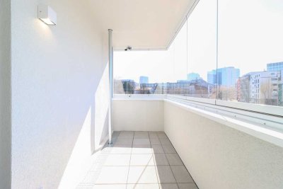 Lichtdurchflutete Familienwohnung mit Loggia, offener Küche und zwei stilvollen Bädern in "Erstbezug