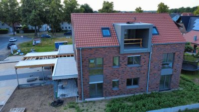 Schöne Neubau 4-Zimmer-Wohnung mit gehobener Innenausstattung sowie Balkon und Einbauküche