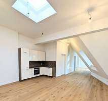 Moderne 2-Zimmer-Dachgeschosswohnung mit Einbauküche | Erstbezug im Herzen von Wilmersdorf