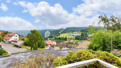 Charmante 2-Zimmer-Terrassenwohnung mit Weitblick, Südbalkon & TG-Stellplatz