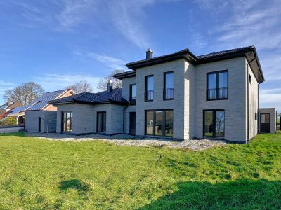 Stadtvilla mit Einliegerwohnung – Moderne Architektur, nachhaltige Technik in Seenähe