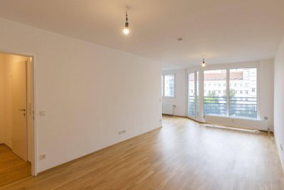 Helle 1,5-Zimmer Wohnung mit Loggia, Fernwärme, Einbauküche und Hofausrichtung