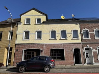 Gepflegtes Wohn- und Geschäftshaus mit Gewerbeeinheit, Anbauten und Garten in Heinsberg-Oberbruch