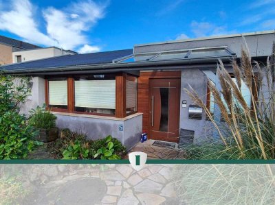 Wohnen auf einer Ebene-gepflegter Bungalow mit Garten und Carport in Lübeck zu verkaufen.