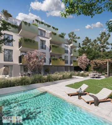 3 Zimmer Erstbezugwohnung mit Balkon! Highlight sind Pool und Outdoorküche im Gemeinschaftsgarten!