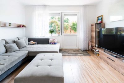 Sanierte 2-Zimmer-Erdgeschosswohnung mit Terrasse, Garten und Garage im Grünen