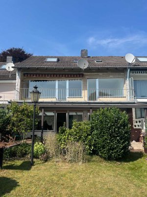 Außergewöhnlich breites Reihenhaus mit Südgrundstück und Pflegebedarf