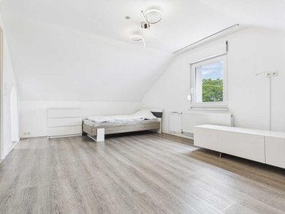 Charmante 2-Zimmer-DG-Wohnung mit Einbauküche und Stellplatz in ruhiger Lage von Münster (Hessen)