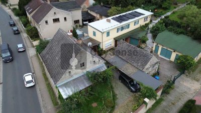 Einfamilienhaus mit Garage mit Entwicklungspotential