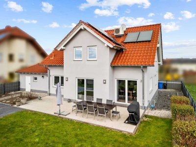 **Gepflegtes Einfamilienwohnhaus in ruhiger Feldrandlage mit viel Potenzial**