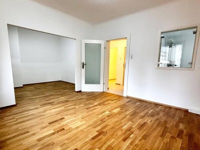 Frisch renovierte 1,5-Zimmer-Wohnung mit separater Küche, Abstellraum &amp; Gemeinschaftsgarten