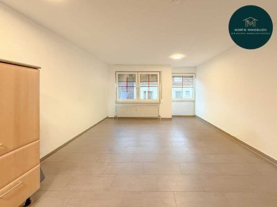 **Helle 1-Zimmer-Wohnung mit Einbauküche und eigenem Stellplatz**