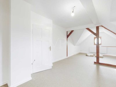 Gemütliche Dachgeschosswohnung im sanierten Denkmal mit spektakulärem Ausblick!