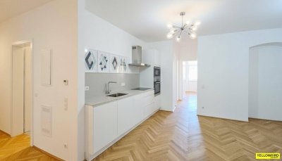 3-Zimmer-Wohnung in direkter U-Bahn-Nähe - 6 m² Freifläche - über 3 Meter Raumhöhe