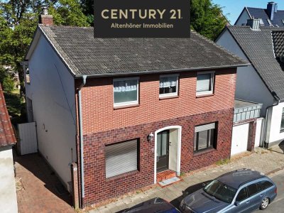 Vermietetes Zweifamilienhaus mit Garten und Garage! Zentrumsnah