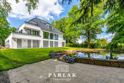 Exklusive High-End Gartenwohnung mit eigenem Teich in repräsentativer Villa