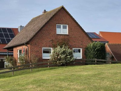 Haus auf dem Deich mit Blick auf´s Wattenmeer auf Baltrum