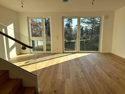Grün soweit das Auge reicht - Stadtvilla mit kühlem Komfort