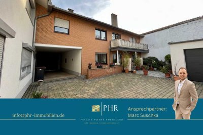 Schöne Erdgeschosswohnung mit Terrasse und Gartenmitbenutzung.